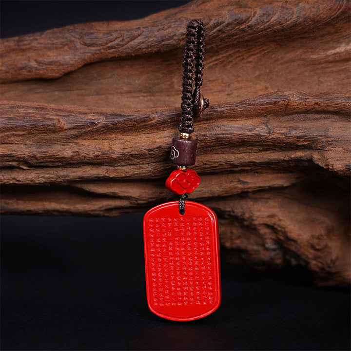 Portachiavi con benedizione del Sutra del cuore in cinabro naturale Buddha Stones