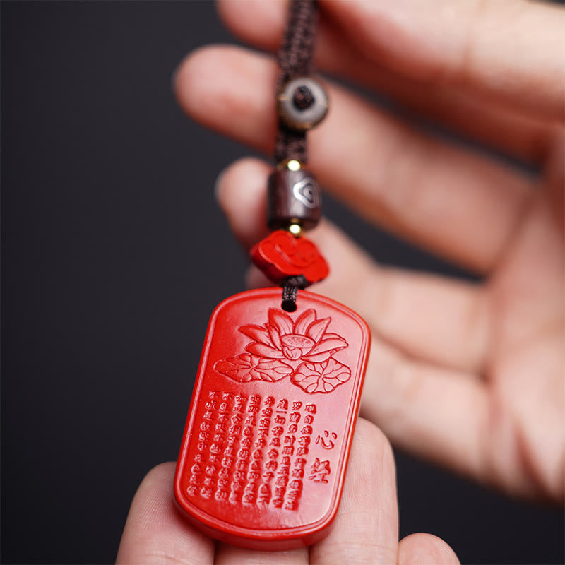 Portachiavi con benedizione del Sutra del cuore in cinabro naturale Buddha Stones