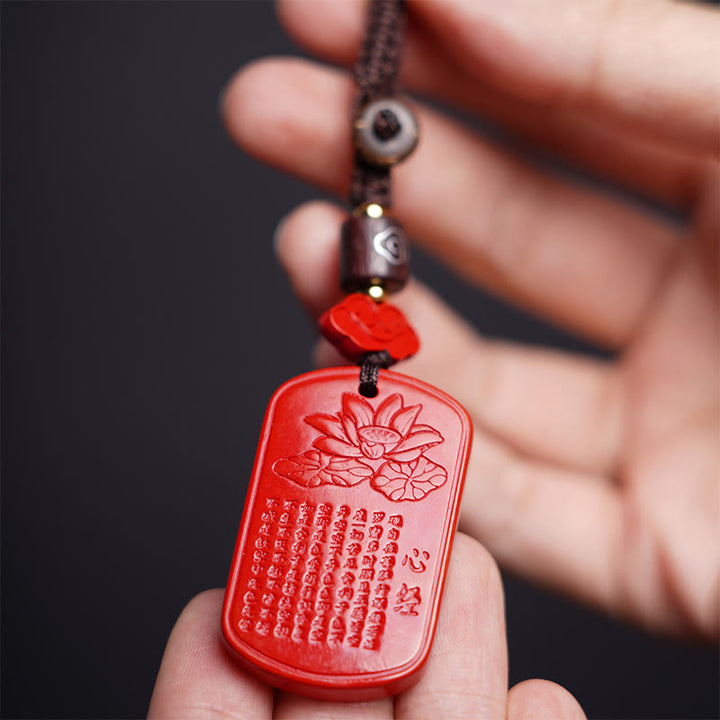 Portachiavi con benedizione del Sutra del cuore in cinabro naturale Buddha Stones
