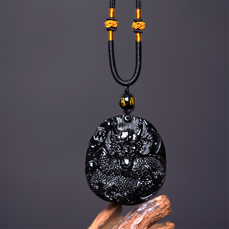 Collana con ciondolo di protezione in ossidiana nera naturale con drago intagliato rotondo in Buddha Stones - image 4