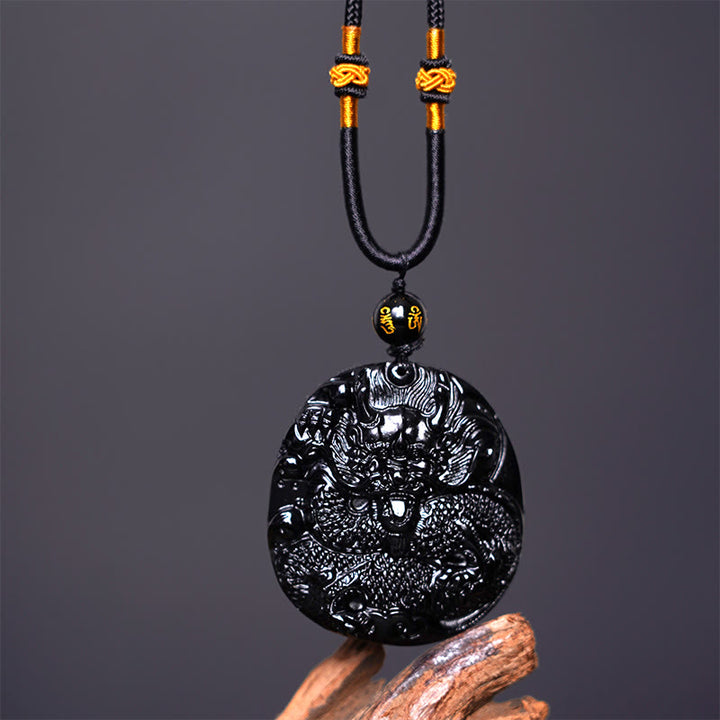 Collana con ciondolo di protezione in ossidiana nera naturale con drago intagliato rotondo in Buddha Stones - image 4