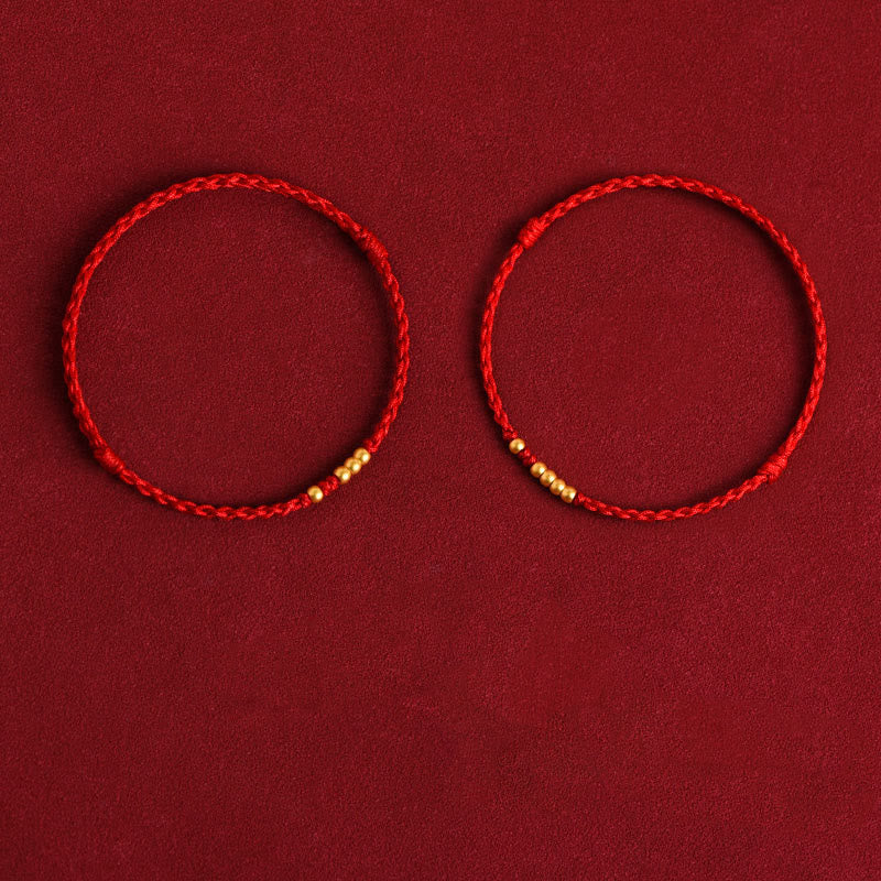 Braccialetto di coppia con protezione intrecciata in perline d'oro 999 Buddha Stones - Corda rossa (una e quattro perle dorate e una e tre perle dorate) - 24 centimetri - image 17