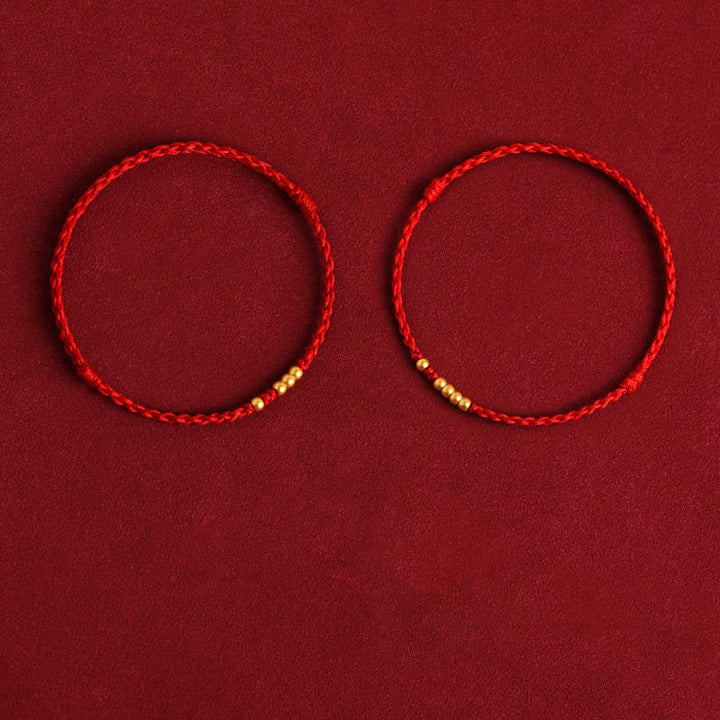 Braccialetto di coppia con protezione intrecciata in perline d'oro 999 Buddha Stones - Corda rossa (una e quattro perle dorate e una e tre perle dorate) - 24 centimetri - image 17