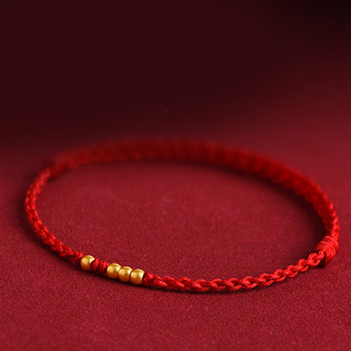 Braccialetto di coppia con protezione intrecciata in perline d'oro 999 Buddha Stones - image 3