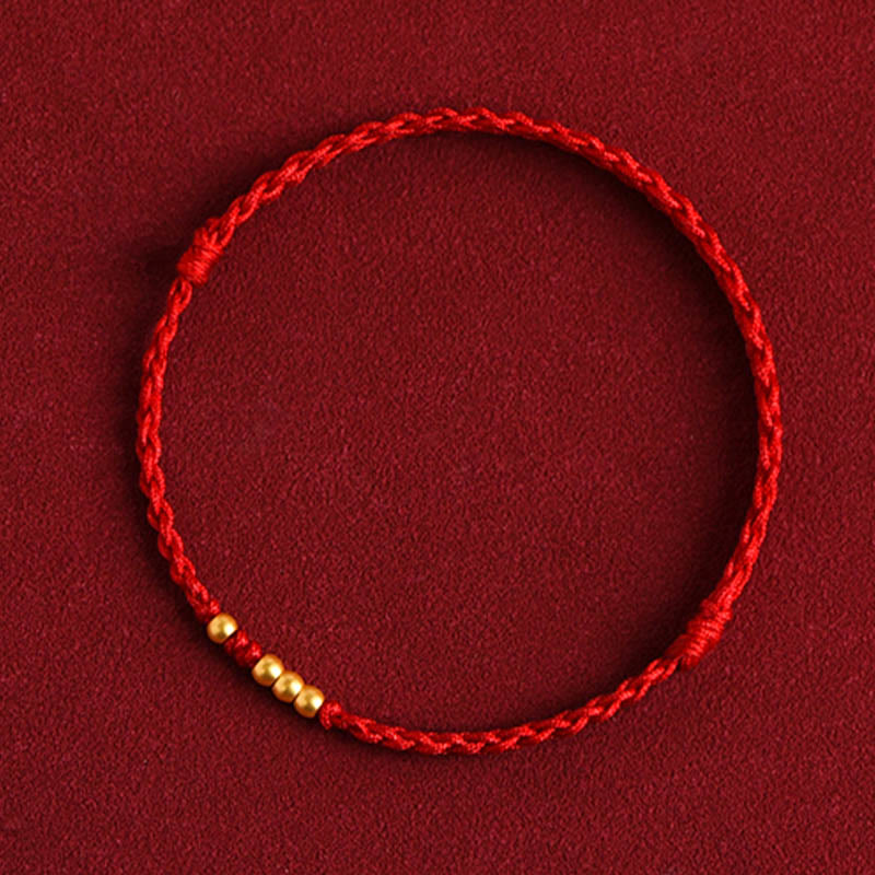 Braccialetto di coppia con protezione intrecciata in perline d'oro 999 Buddha Stones - image 1