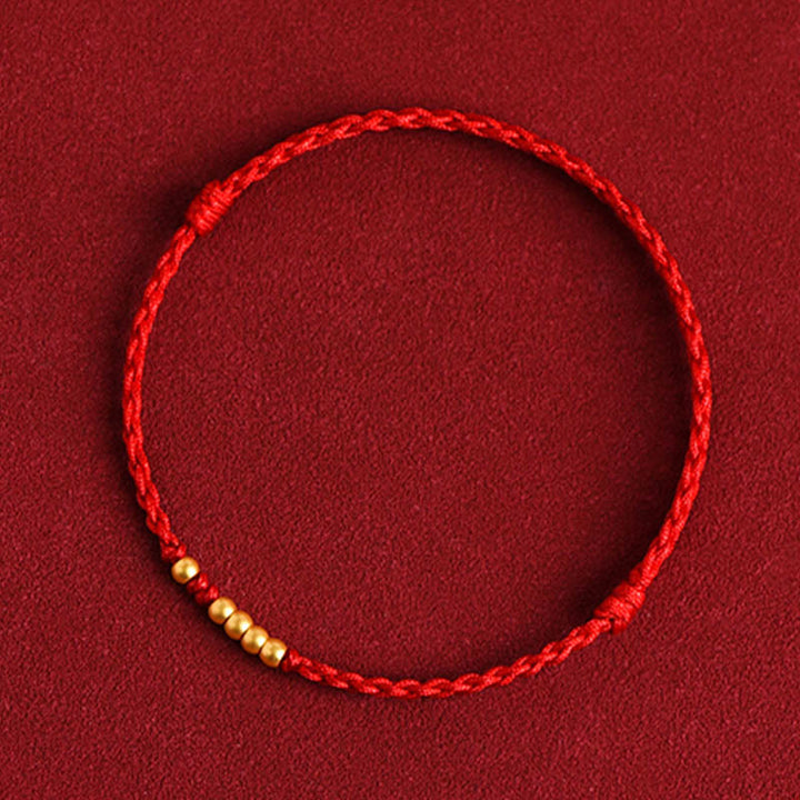 Braccialetto di coppia con protezione intrecciata in perline d'oro 999 Buddha Stones - Corda rossa (una e quattro perline d'oro) - 24 cm - image 9