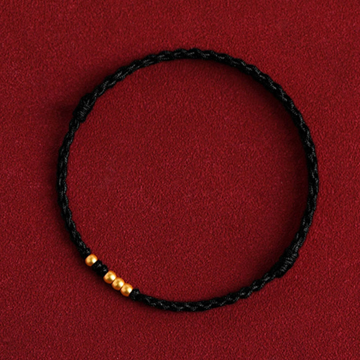 Braccialetto di coppia con protezione intrecciata in perline d'oro 999 Buddha Stones - Corda nera (una e tre perle dorate) - 24 centimetri - image 15