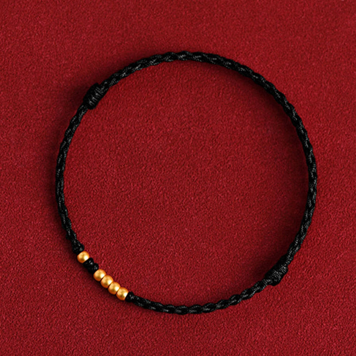 Braccialetto di coppia con protezione intrecciata in perline d'oro 999 Buddha Stones - Corda nera (una e quattro perline dorate) - 24 cm - image 16