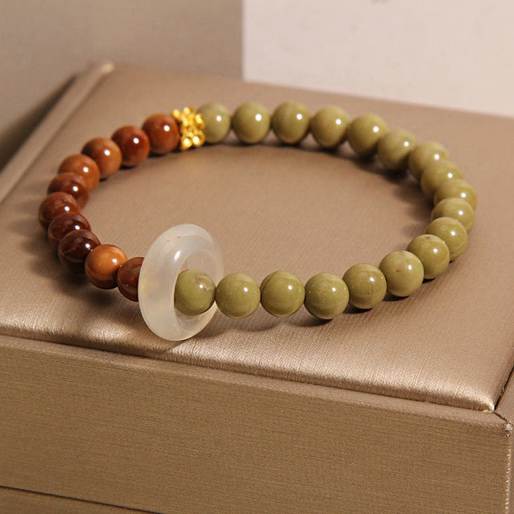 Braccialetto di incoraggiamento con semi di agata naturale di Alashan e pietre Buddha Stones