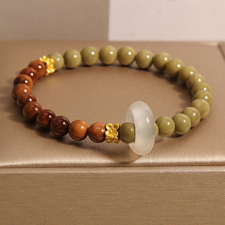 Braccialetto di incoraggiamento con semi di agata naturale di Alashan e pietre Buddha Stones