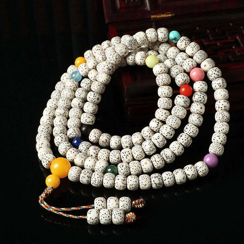 Braccialetto della ricchezza in agata ambrata con semi di Bodhi tibetano e pietre Buddha Stones