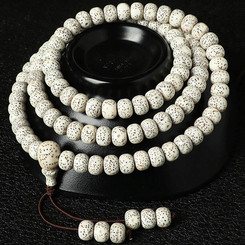 Braccialetto della ricchezza in agata ambrata con semi di Bodhi tibetano e pietre Buddha Stones