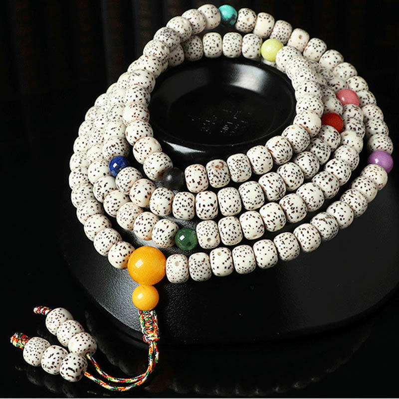 Braccialetto della ricchezza in agata ambrata con semi di Bodhi tibetano e pietre Buddha Stones