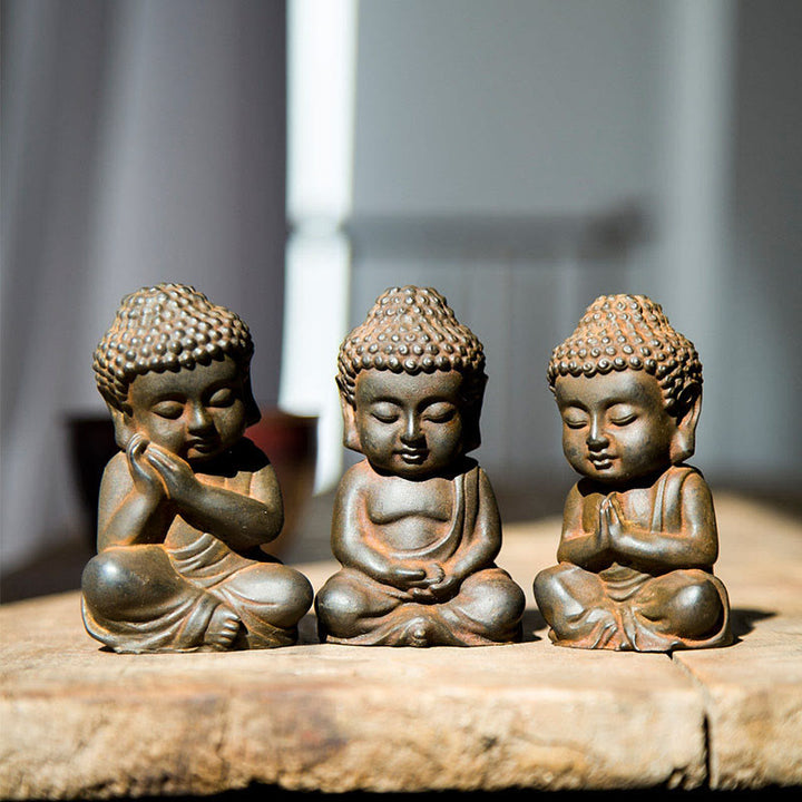 Buddha Stones fatte a mano Piccolo Buddha Sakyamuni in polvere di ferro Statua in resina fusa ruggine Decorazione