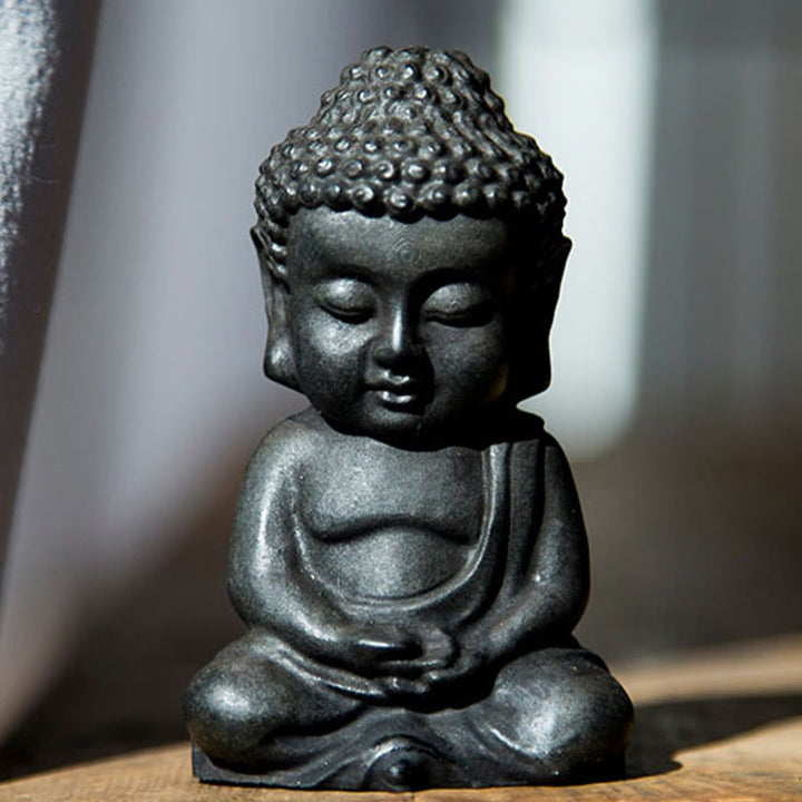 Buddha Stones fatte a mano Piccolo Buddha Sakyamuni in polvere di ferro Statua in resina fusa ruggine Decorazione
