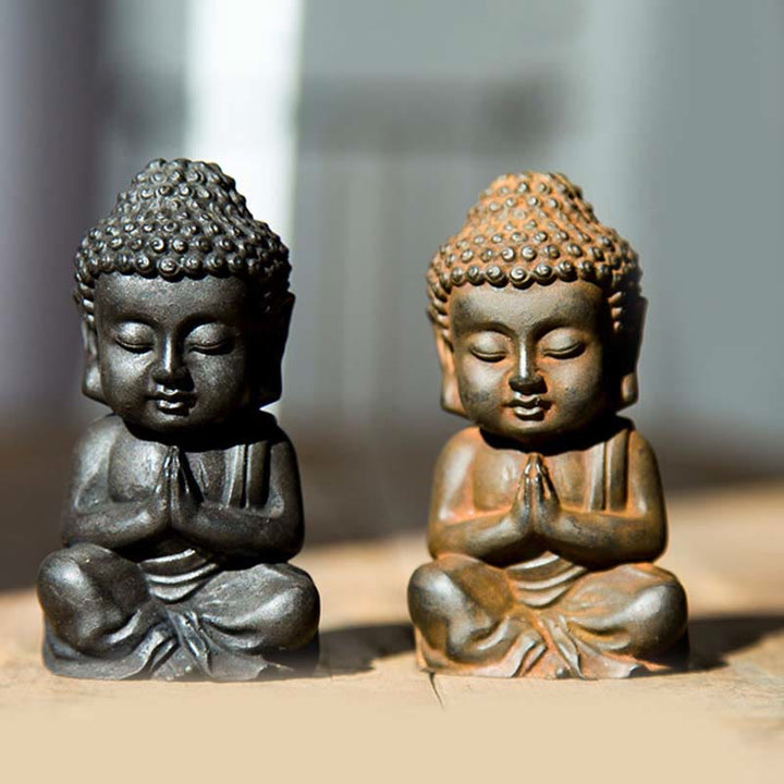 Buddha Stones fatte a mano Piccolo Buddha Sakyamuni in polvere di ferro Statua in resina fusa ruggine Decorazione