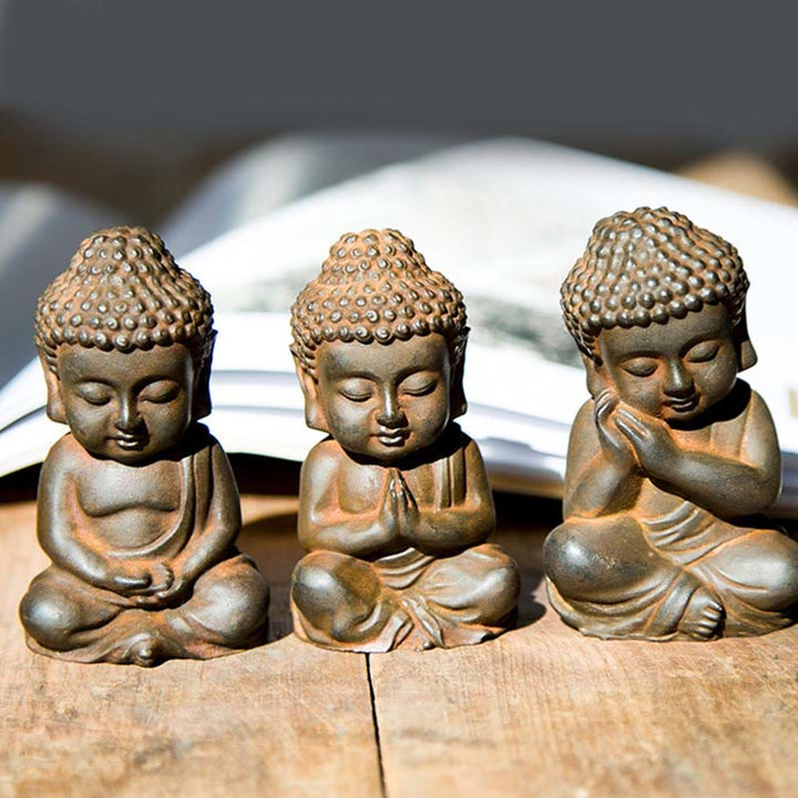 Buddha Stones fatte a mano Piccolo Buddha Sakyamuni in polvere di ferro Statua in resina fusa ruggine Decorazione