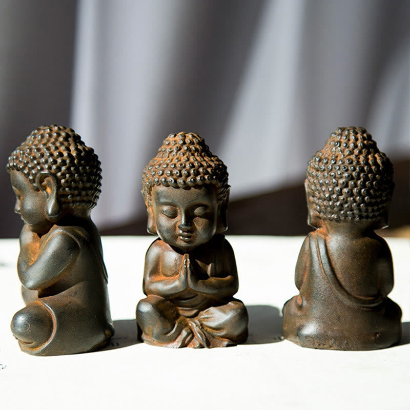 Buddha Stones fatte a mano Piccolo Buddha Sakyamuni in polvere di ferro Statua in resina fusa ruggine Decorazione