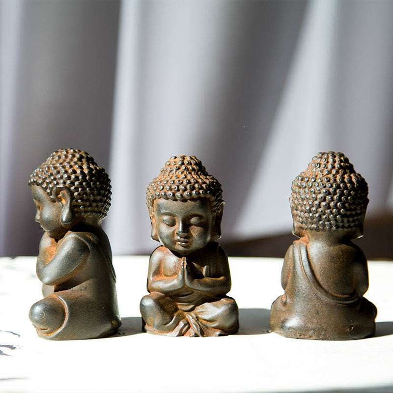 Buddha Stones fatte a mano Piccolo Buddha Sakyamuni in polvere di ferro Statua in resina fusa ruggine Decorazione