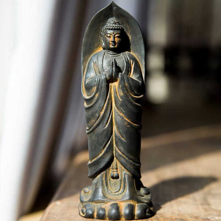 Decorazione della statua in resina colata di polvere di ferro Sakyamuni Buddha Namaste fatta a mano Buddha Stones