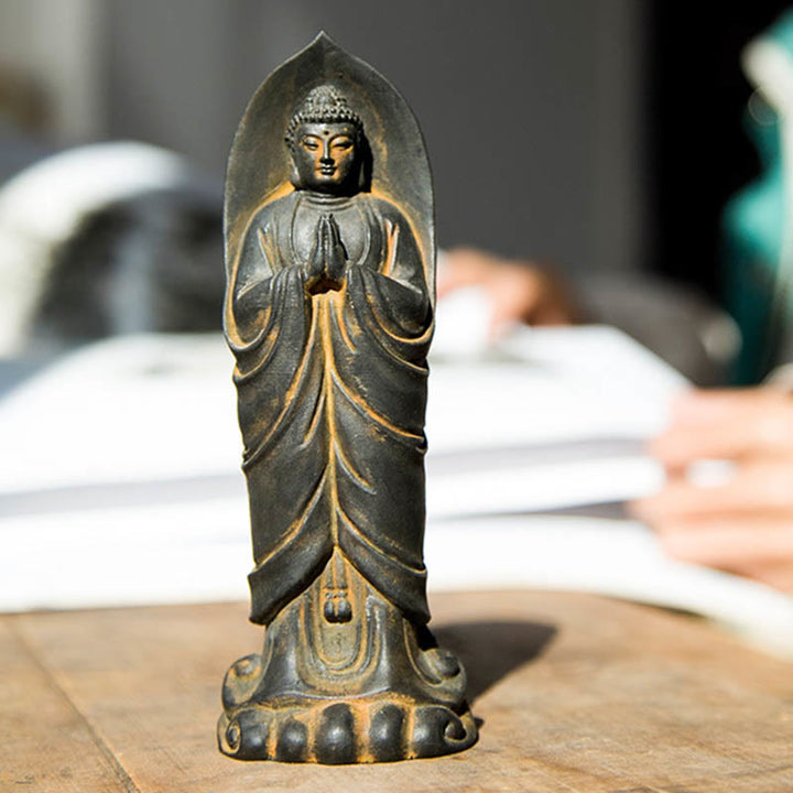 Decorazione della statua in resina colata di polvere di ferro Sakyamuni Buddha Namaste fatta a mano Buddha Stones