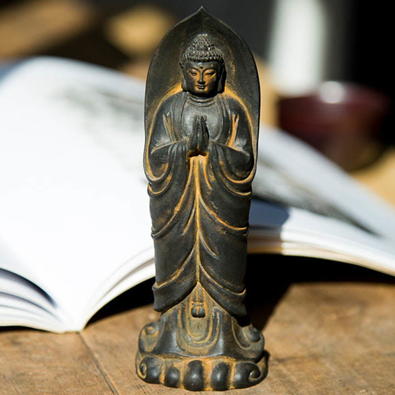 Decorazione della statua in resina colata di polvere di ferro Sakyamuni Buddha Namaste fatta a mano Buddha Stones