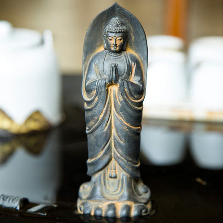 Decorazione della statua in resina colata di polvere di ferro Sakyamuni Buddha Namaste fatta a mano Buddha Stones