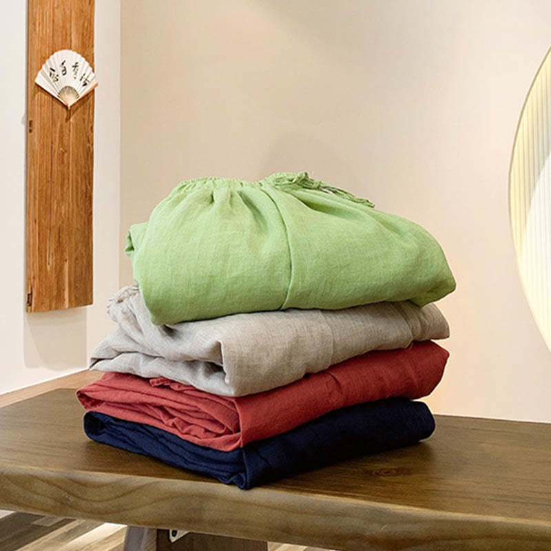 Pantaloni estivi in ​​lino tinta unita con coulisse e tasche Buddha Stones - image 1