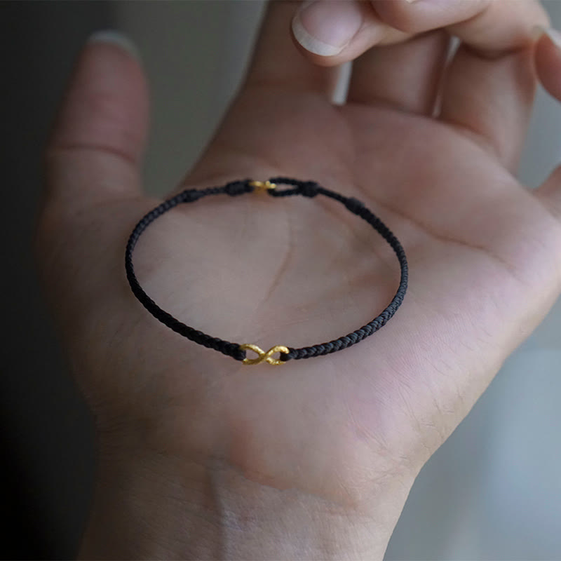 Braccialetto di corda della fortuna fatto a mano con nodo infinito in oro 999 Buddha Stones