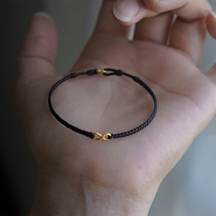 Braccialetto di corda della fortuna fatto a mano con nodo infinito in oro 999 Buddha Stones