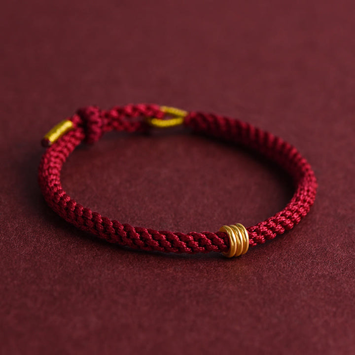 Braccialetto in corda intrecciata con design a triplo anello in oro 999 Buddha Stones