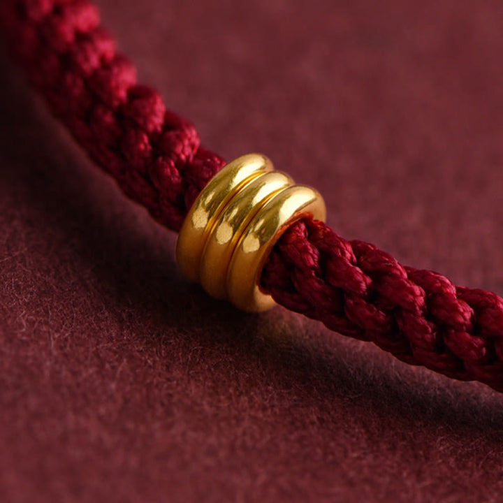 Braccialetto in corda intrecciata con design a triplo anello in oro 999 Buddha Stones