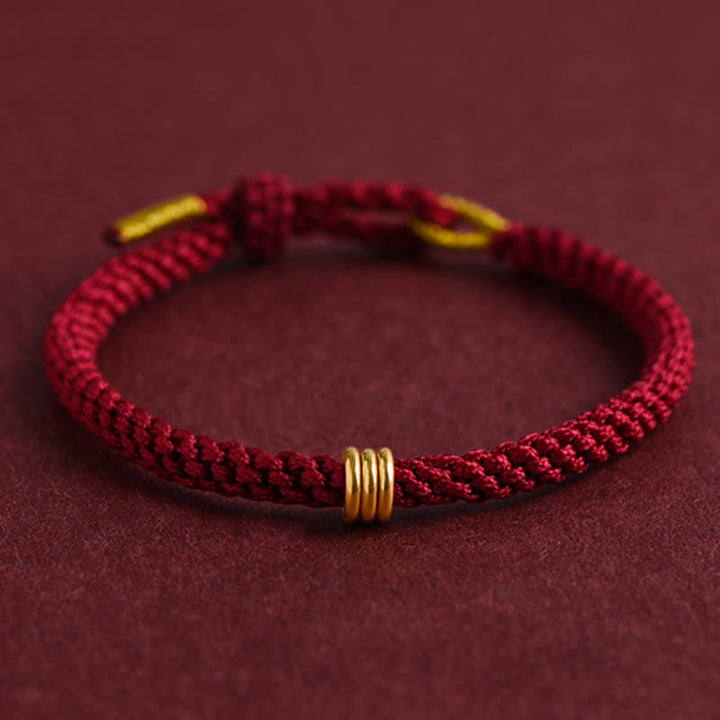 Braccialetto in corda intrecciata con design a triplo anello in oro 999 Buddha Stones