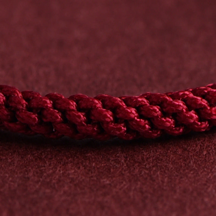 Braccialetto in corda intrecciata con design a triplo anello in oro 999 Buddha Stones - image 11