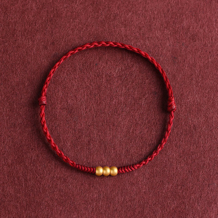 Buddha Stones 999 Oro Mini Tre Perline Design Fatto a Mano Corda della Fortuna Bracciale Cavigliera - Cavigliera (circonferenza 18-30 cm) - Rosso scuro - image 7