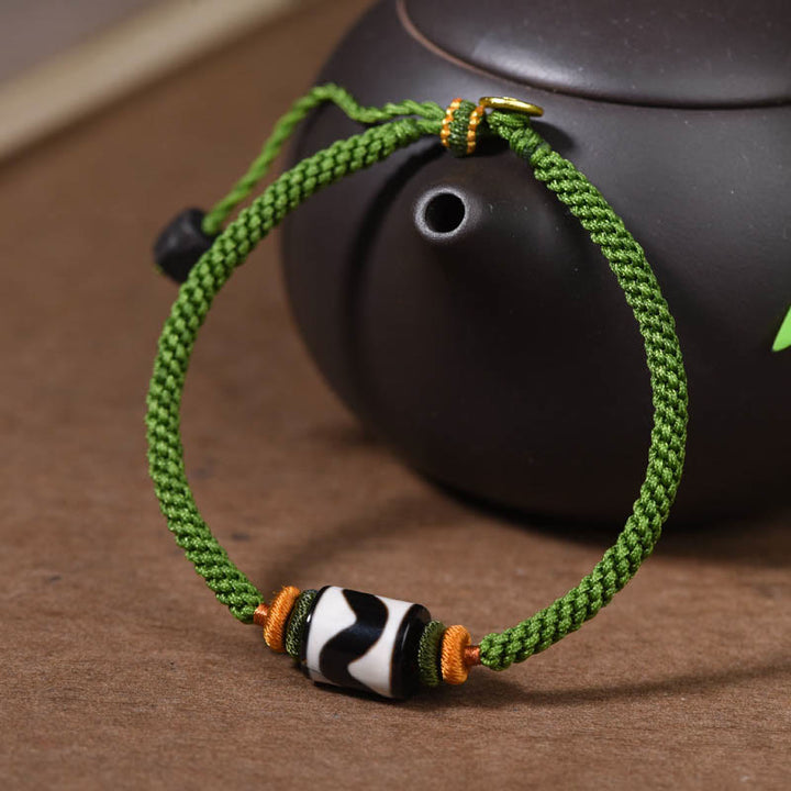 Braccialetto di corda verde intrecciata con perline tibetane Dzi fatte a mano di Buddha Stones
