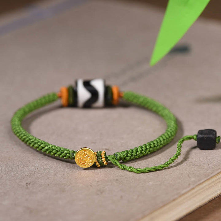 Braccialetto di corda verde intrecciata con perline tibetane Dzi fatte a mano di Buddha Stones