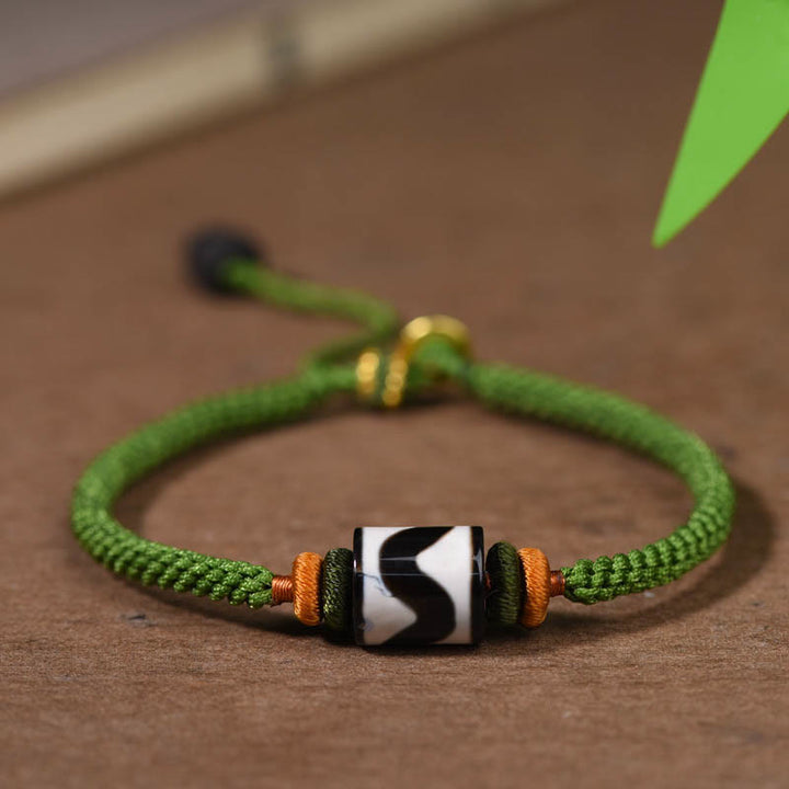 Braccialetto di corda verde intrecciata con perline tibetane Dzi fatte a mano di Buddha Stones