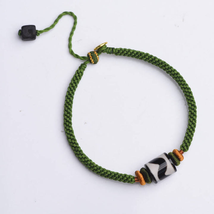 Braccialetto di corda verde intrecciata con perline tibetane Dzi fatte a mano di Buddha Stones