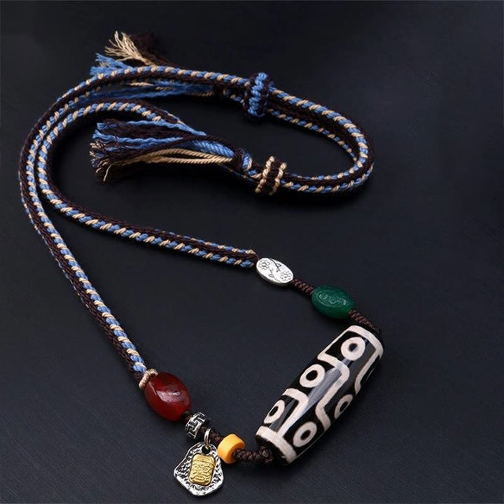 Collana con ciondolo in corda intrecciata con perline Dzi tibetane a nove occhi Buddha Stones