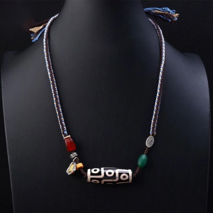 Collana con ciondolo in corda intrecciata con perline Dzi tibetane a nove occhi Buddha Stones
