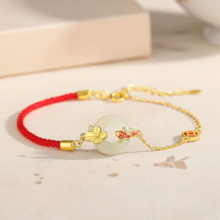 Braccialetto in corda rossa Buddha Stones fibbia della pace in argento sterling 925 fatto a mano in giada Hetian cinese con pesce rosso