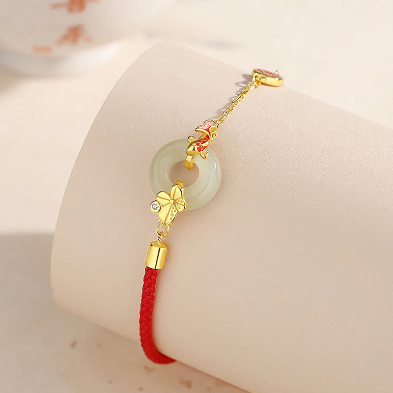 Braccialetto in corda rossa Buddha Stones fibbia della pace in argento sterling 925 fatto a mano in giada Hetian cinese con pesce rosso