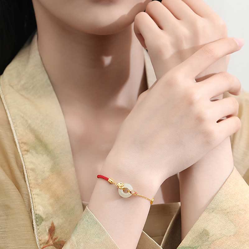 Braccialetto in corda rossa Buddha Stones fibbia della pace in argento sterling 925 fatto a mano in giada Hetian cinese con pesce rosso