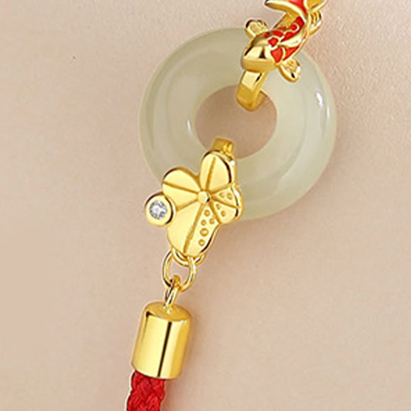 Braccialetto in corda rossa Buddha Stones fibbia della pace in argento sterling 925 fatto a mano in giada Hetian cinese con pesce rosso