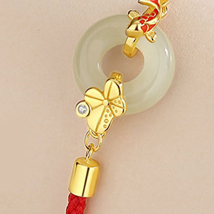 Braccialetto in corda rossa Buddha Stones fibbia della pace in argento sterling 925 fatto a mano in giada Hetian cinese con pesce rosso
