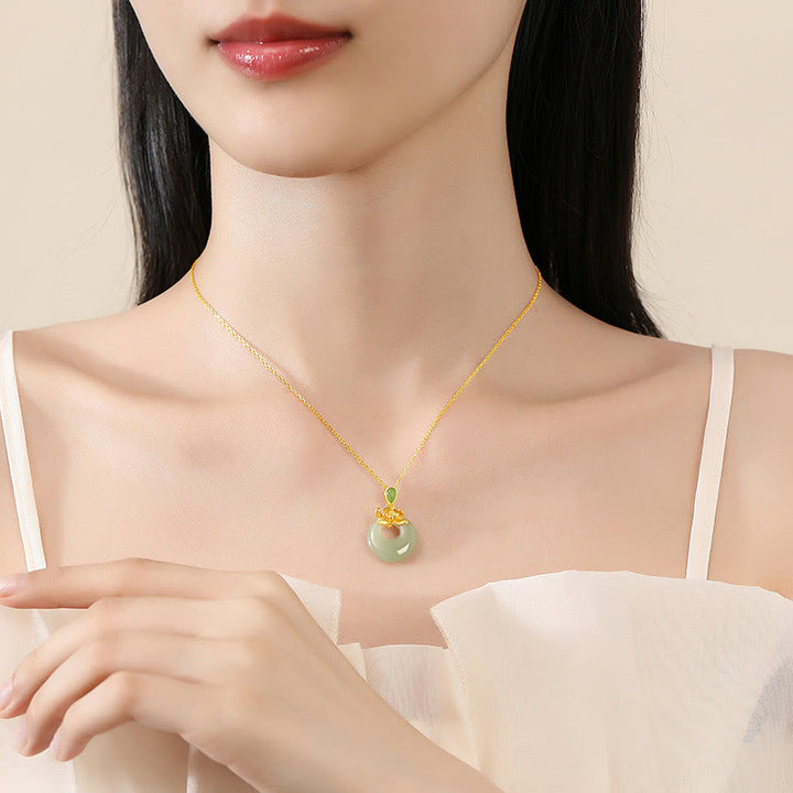 Collana con ciondolo in corda con Buddha Stones, giada e loto, abbondanza