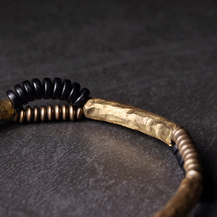 Braccialetto fatto a mano in legno di ebano vintage con Buddha Stones, rame, fortuna e ricchezza