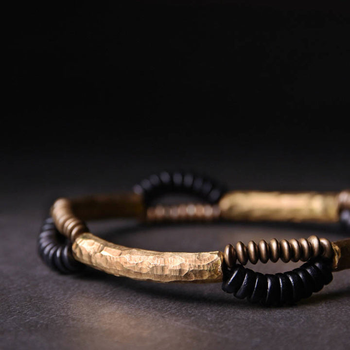 Braccialetto fatto a mano in legno di ebano vintage con Buddha Stones, rame, fortuna e ricchezza