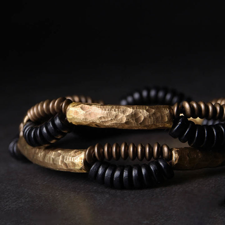 Braccialetto fatto a mano in legno di ebano vintage con Buddha Stones, rame, fortuna e ricchezza
